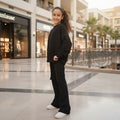 Person standing outdoors on open air mall