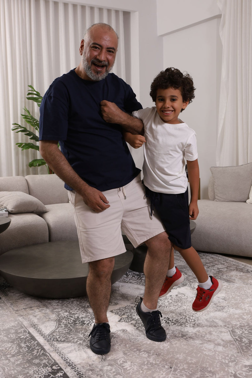 Father and children wearing matching Tito's Wear outfits — Daddy & Me bundle