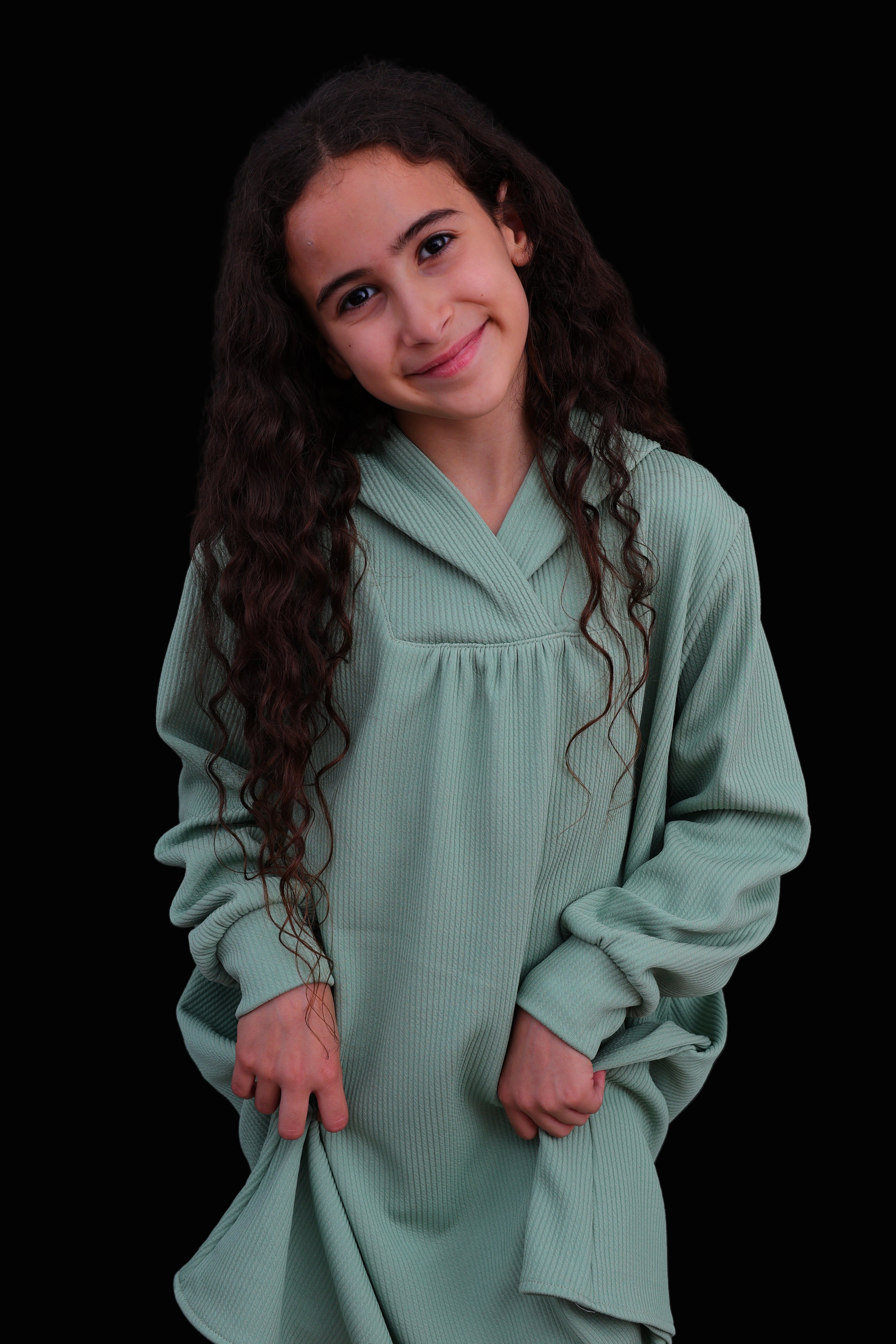 Girl wearing mint green dress